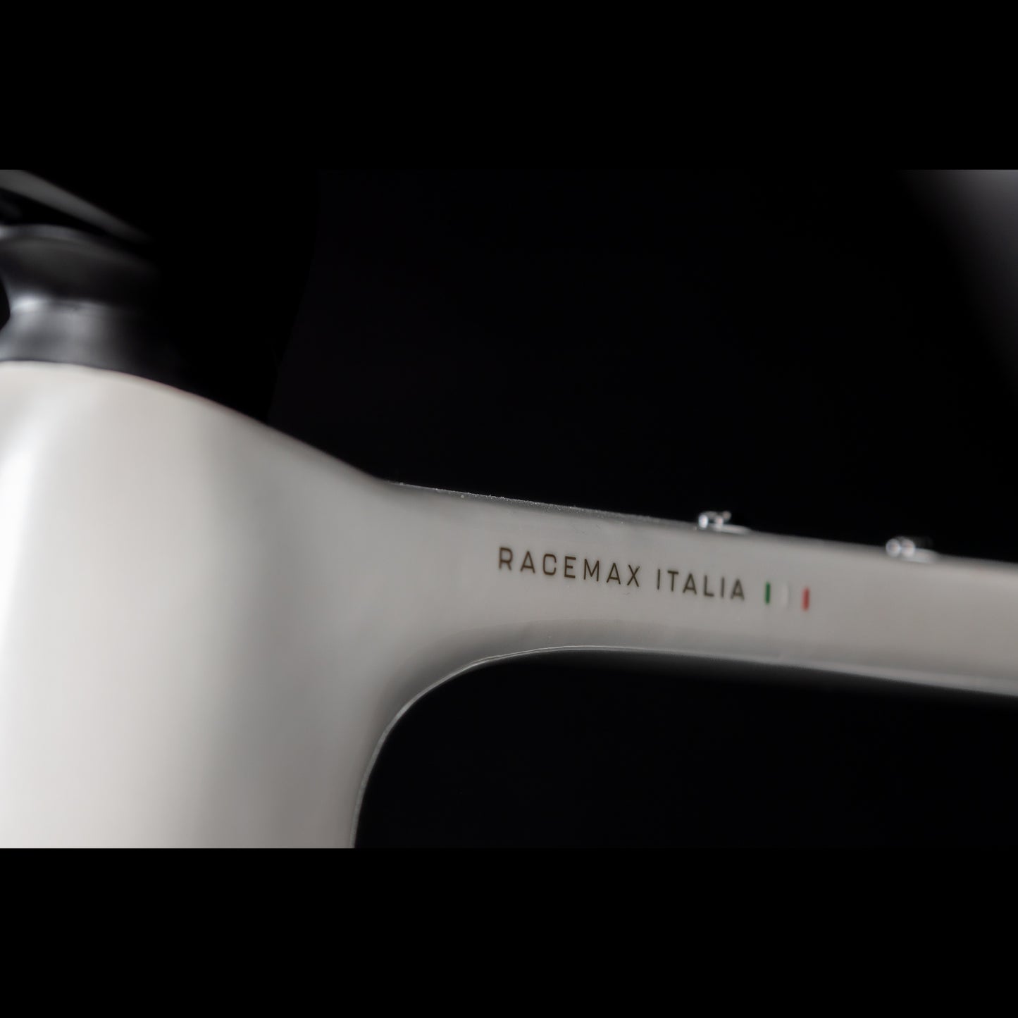 3T Racemax Italia size 54 in Pearl White, equipped with 50mm DT Swiss GRC 1400 wheels and Shimano GRX Di2 12-speed electronic drivetrain, photographed against a sleek black background.