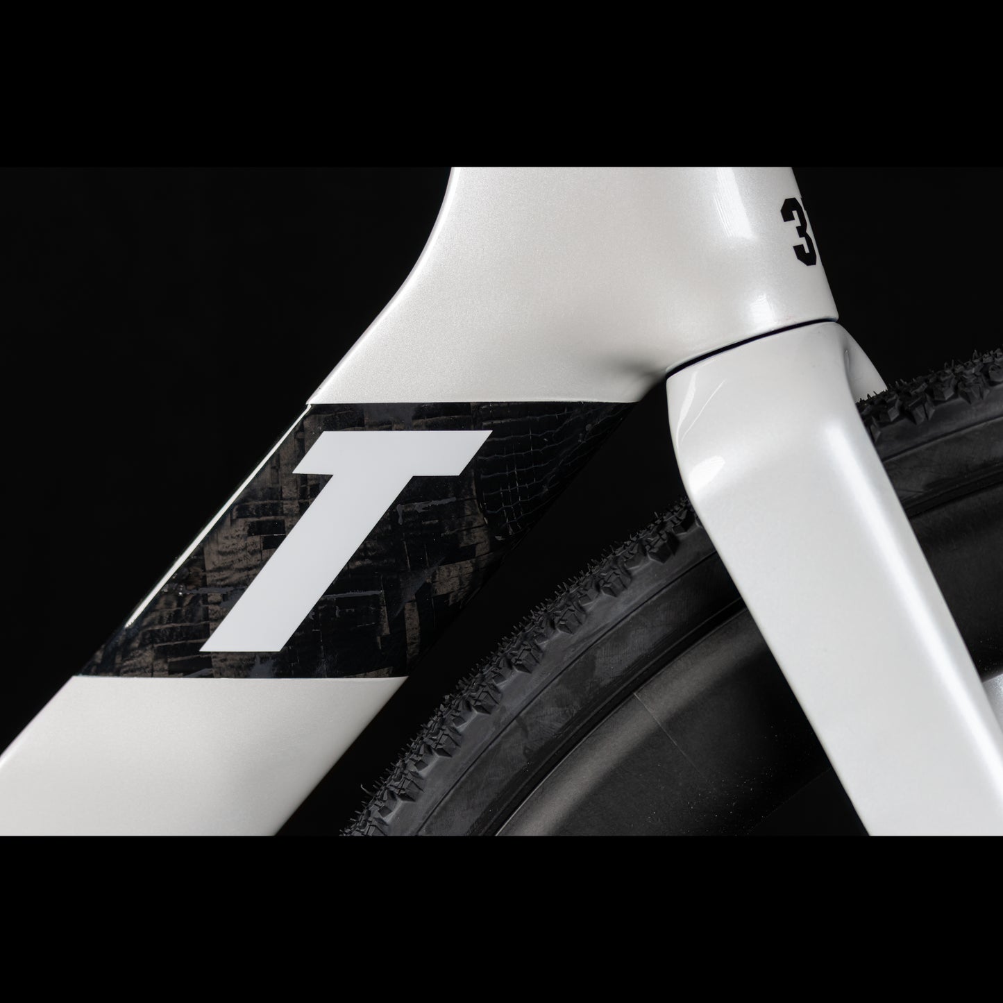 3T Racemax Italia size 54 in Pearl White, equipped with 50mm DT Swiss GRC 1400 wheels and Shimano GRX Di2 12-speed electronic drivetrain, photographed against a sleek black background.