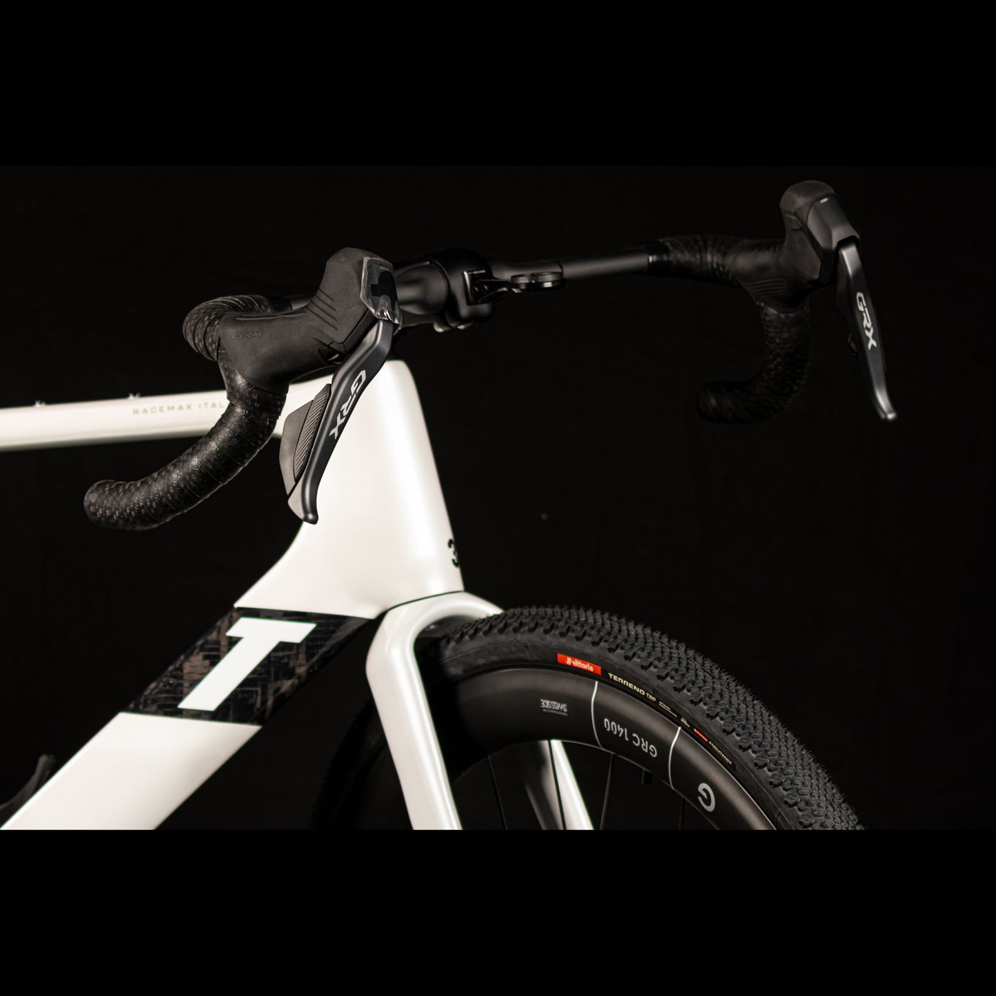 3T Racemax Italia size 54 in Pearl White, equipped with 50mm DT Swiss GRC 1400 wheels and Shimano GRX Di2 12-speed electronic drivetrain, photographed against a sleek black background.