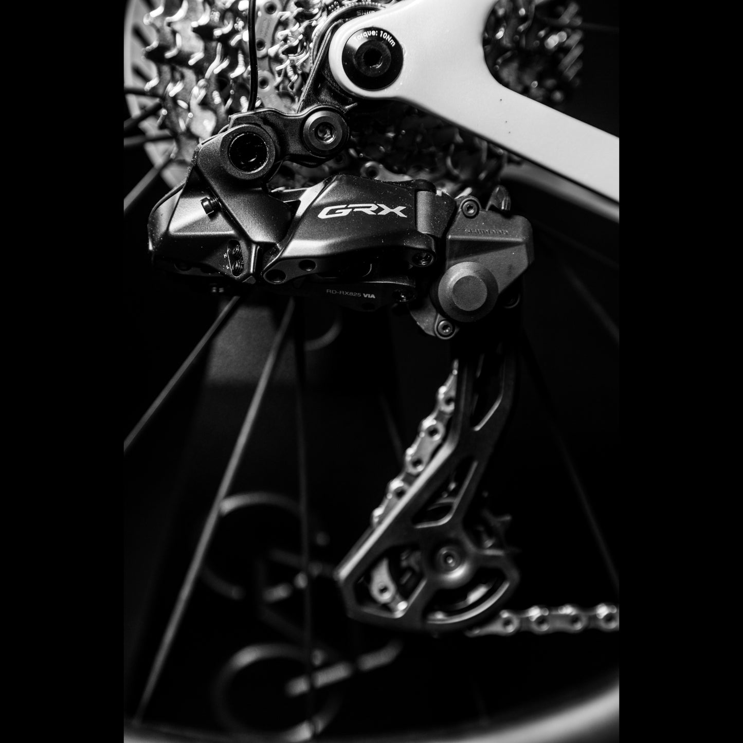 3T Racemax Italia size 54 in Pearl White, equipped with 50mm DT Swiss GRC 1400 wheels and Shimano GRX Di2 12-speed electronic drivetrain, photographed against a sleek black background.
