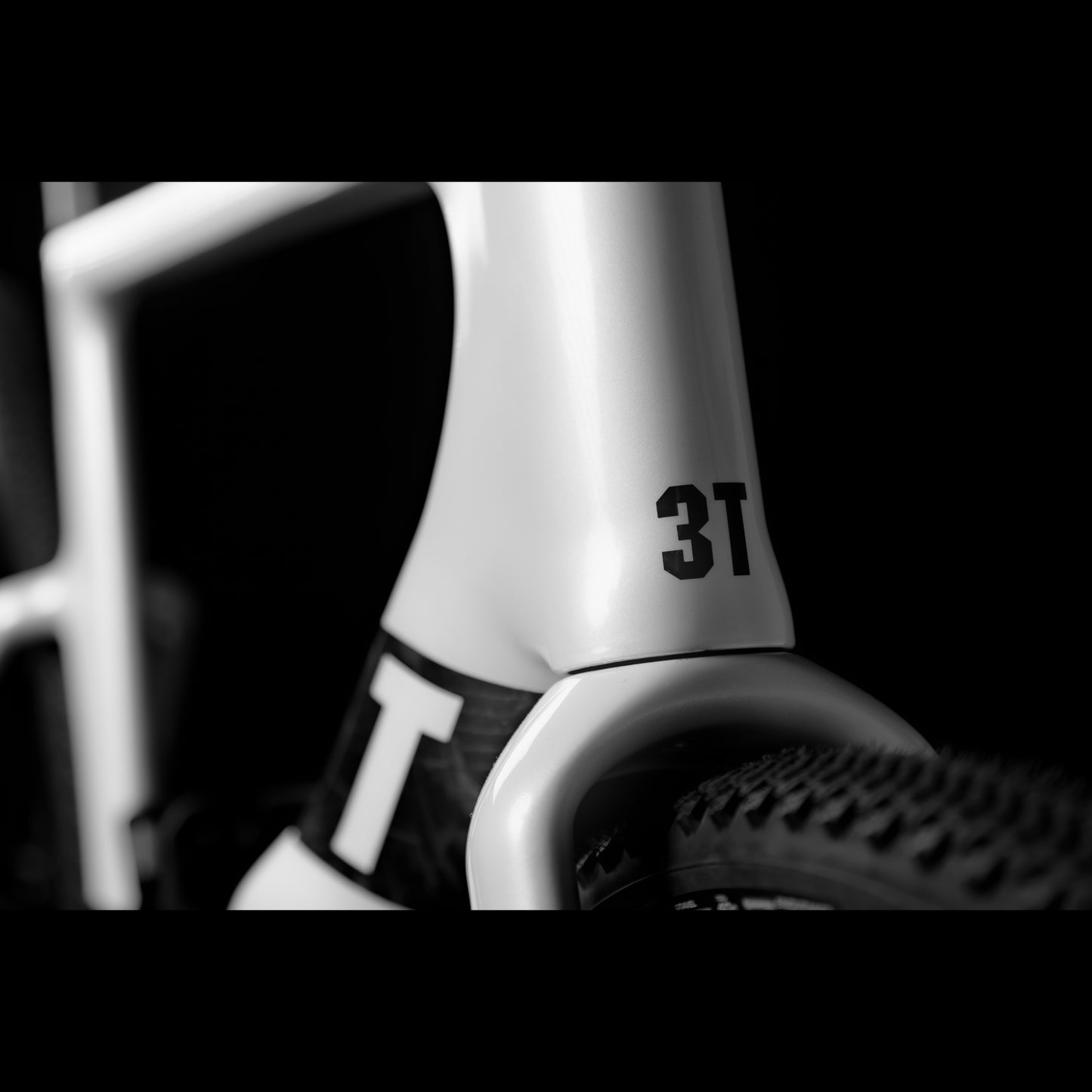 3T Racemax Italia size 54 in Pearl White, equipped with 50mm DT Swiss GRC 1400 wheels and Shimano GRX Di2 12-speed electronic drivetrain, photographed against a sleek black background.