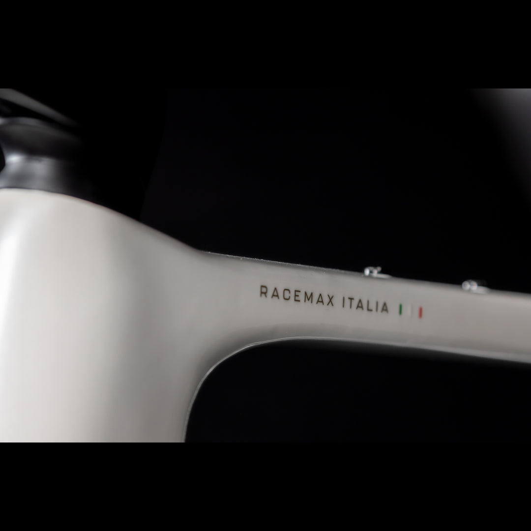 3T Racemax Italia size 54 in Pearl White, equipped with 50mm DT Swiss GRC 1400 wheels and Shimano GRX Di2 12-speed electronic drivetrain, photographed against a sleek black background.