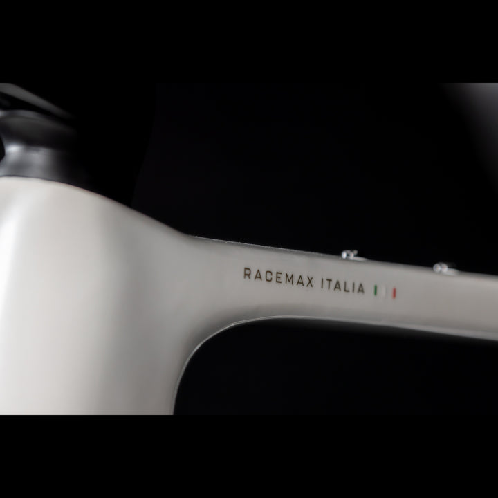 3T Racemax Italia size 54 in Pearl White, equipped with 50mm DT Swiss GRC 1400 wheels and Shimano GRX Di2 12-speed electronic drivetrain, photographed against a sleek black background.