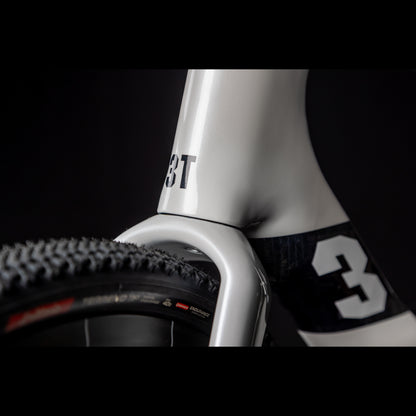 3T Racemax Italia size 54 in Pearl White, equipped with 50mm DT Swiss GRC 1400 wheels and Shimano GRX Di2 12-speed electronic drivetrain, photographed against a sleek black background.