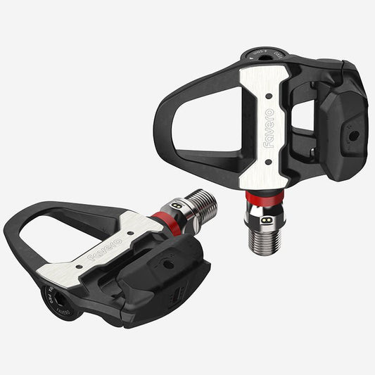 Pair of black and silver bicycle pedals on a white background