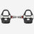 Pair of black and silver bicycle pedals on a light gray background