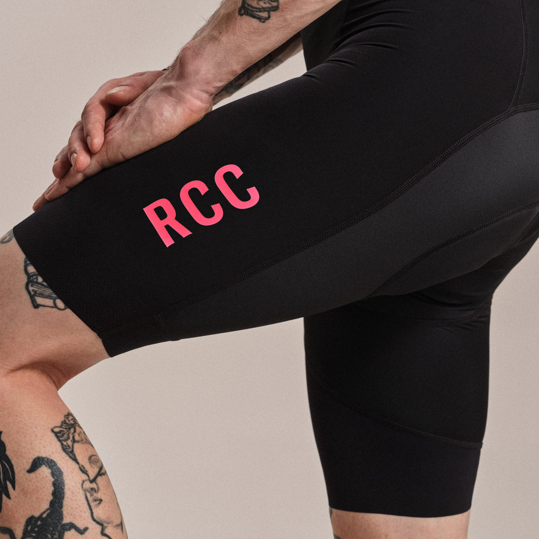 Rapha Men's RCC Pro Team Bib Shorts III (Black/High-Vis Pink) - Dragonspine Cycling