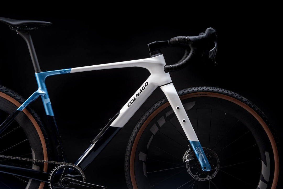 Colnago G5-X gravel bike in blue on a black background