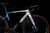 Colnago G5-X gravel bike in blue on a black background